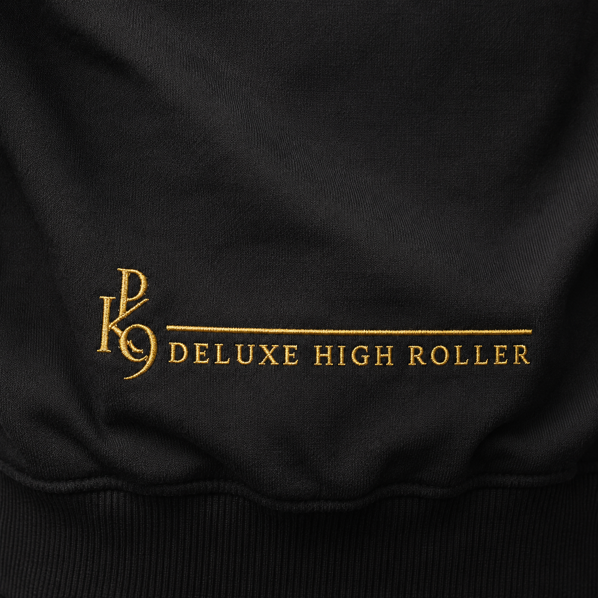 Deluxe High Roller noir – gros plan broderie bas du dos or