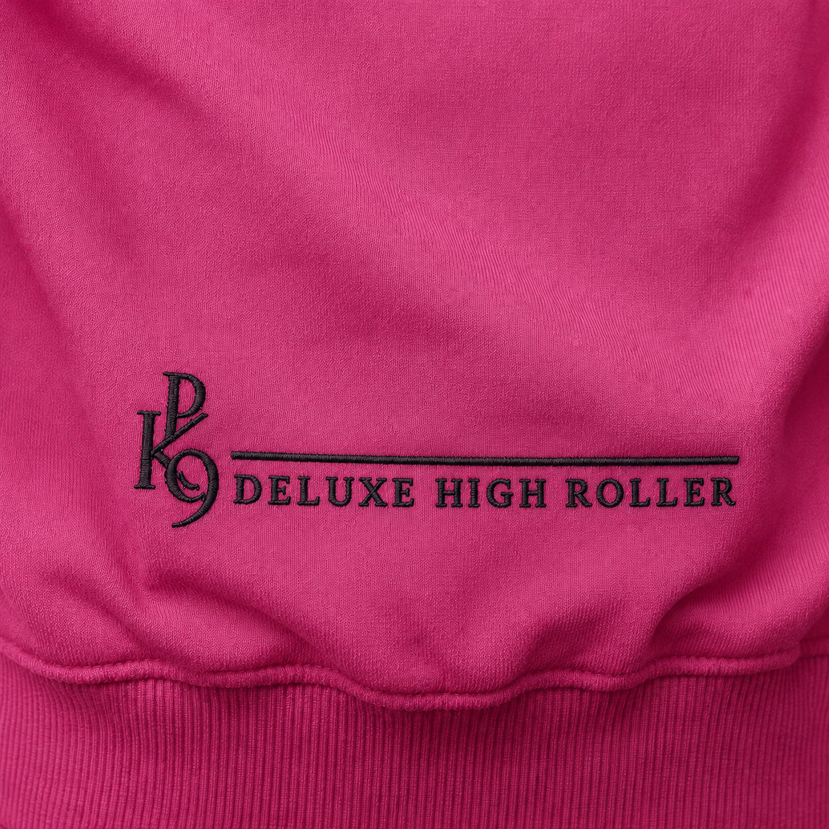 Deluxe High Roller rose – gros plan broderie bas du dos noire
