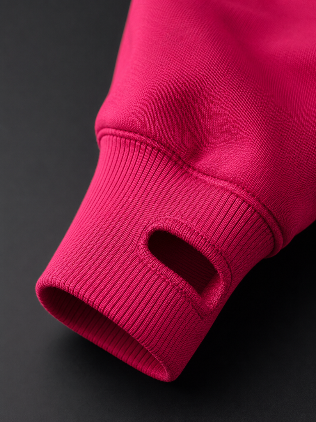 Détail du passe-pouce renforcé du Zipper Deluxe APC